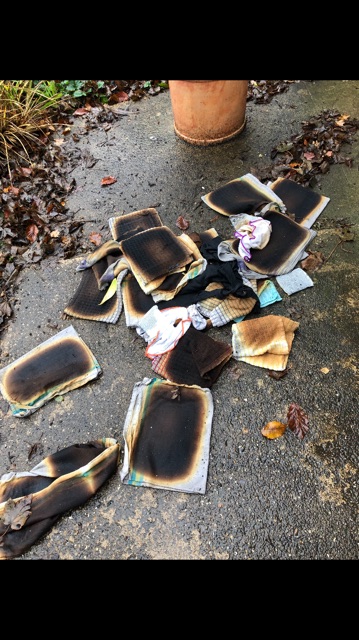 Damage to tea towels which were left stacked after being taken from the tumble dryer