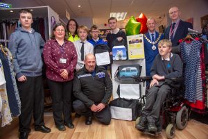 PCSO Alex Franklin photographed with the team from Isebrook College, with teachers and Kettering's mayor James Burton