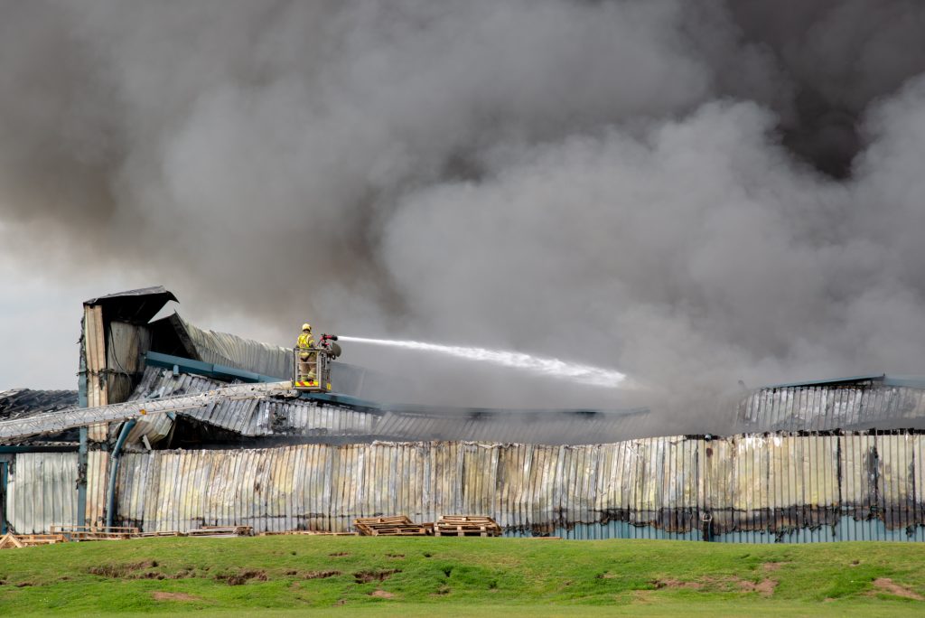 Firefighter on aerial ladder platform at an incident