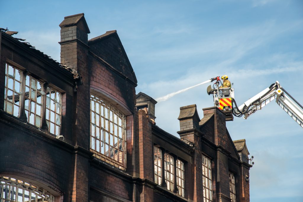 Firefighter on aerial ladder platform at an incident