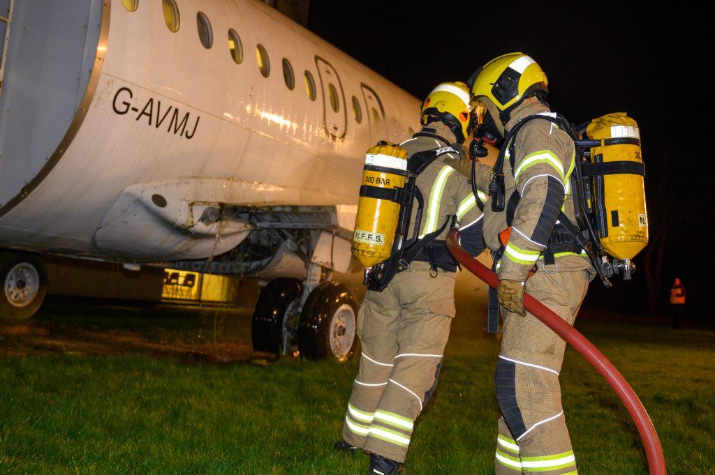 Firefighters tackle plane fire in training scenario