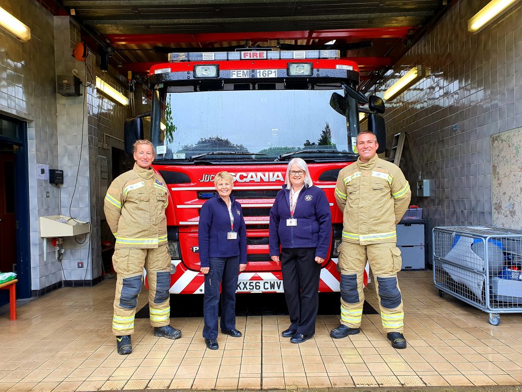 Firefighters with members of the Prevention team