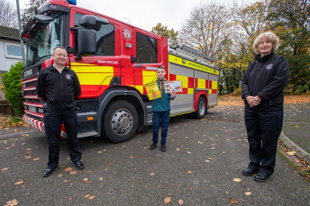 Winner Callum Stewart, centre, with Prevention Team Leader Darren Carson and Youth Engagement Officer Michelle Bates