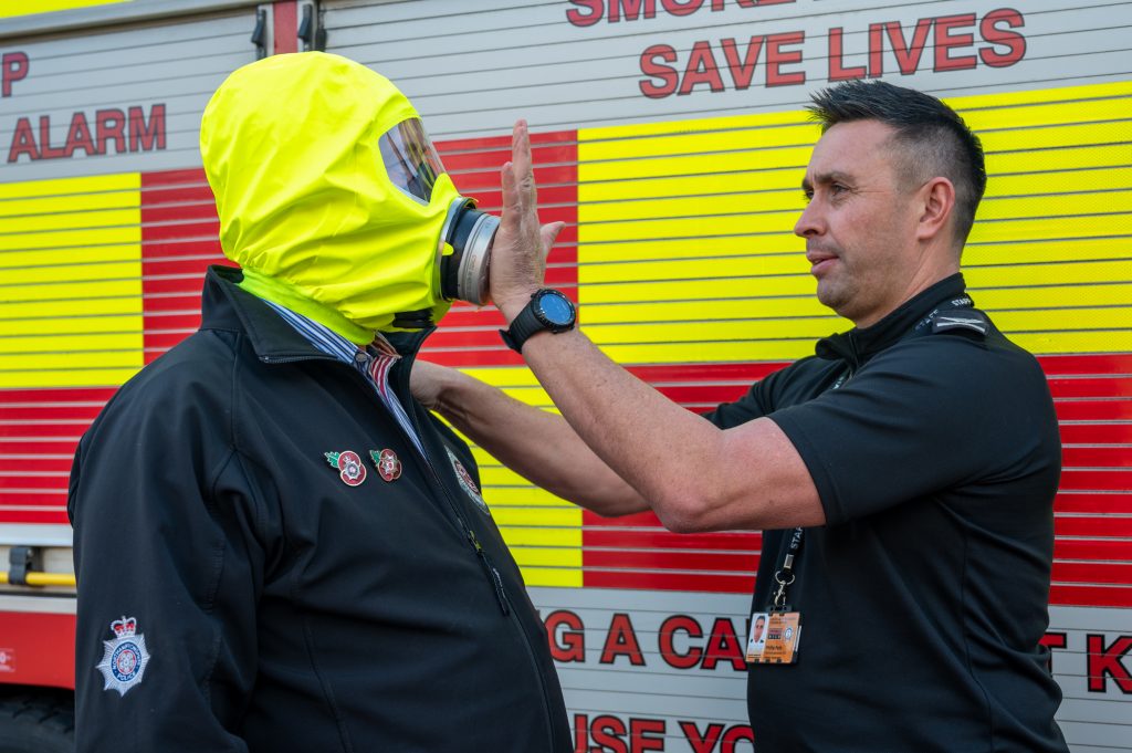 Area Manager Phil Pells demonstrating the use of a smoke hood