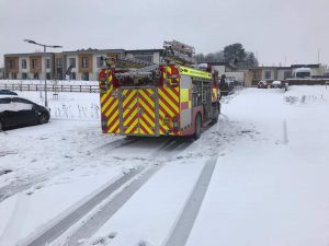 Firefighters step in to clear vaccination centres of snow