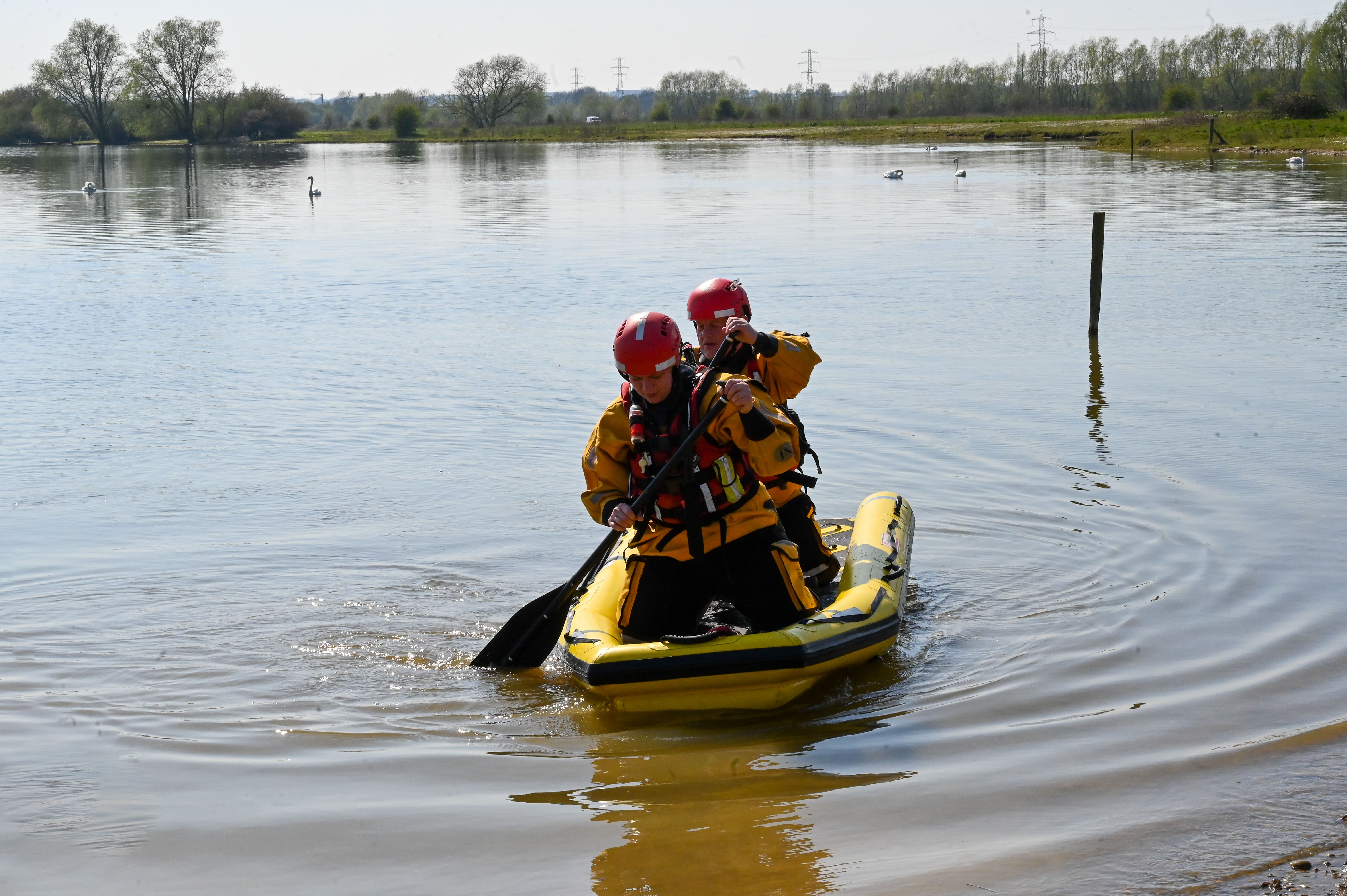 Two firefighters during a water exercise
