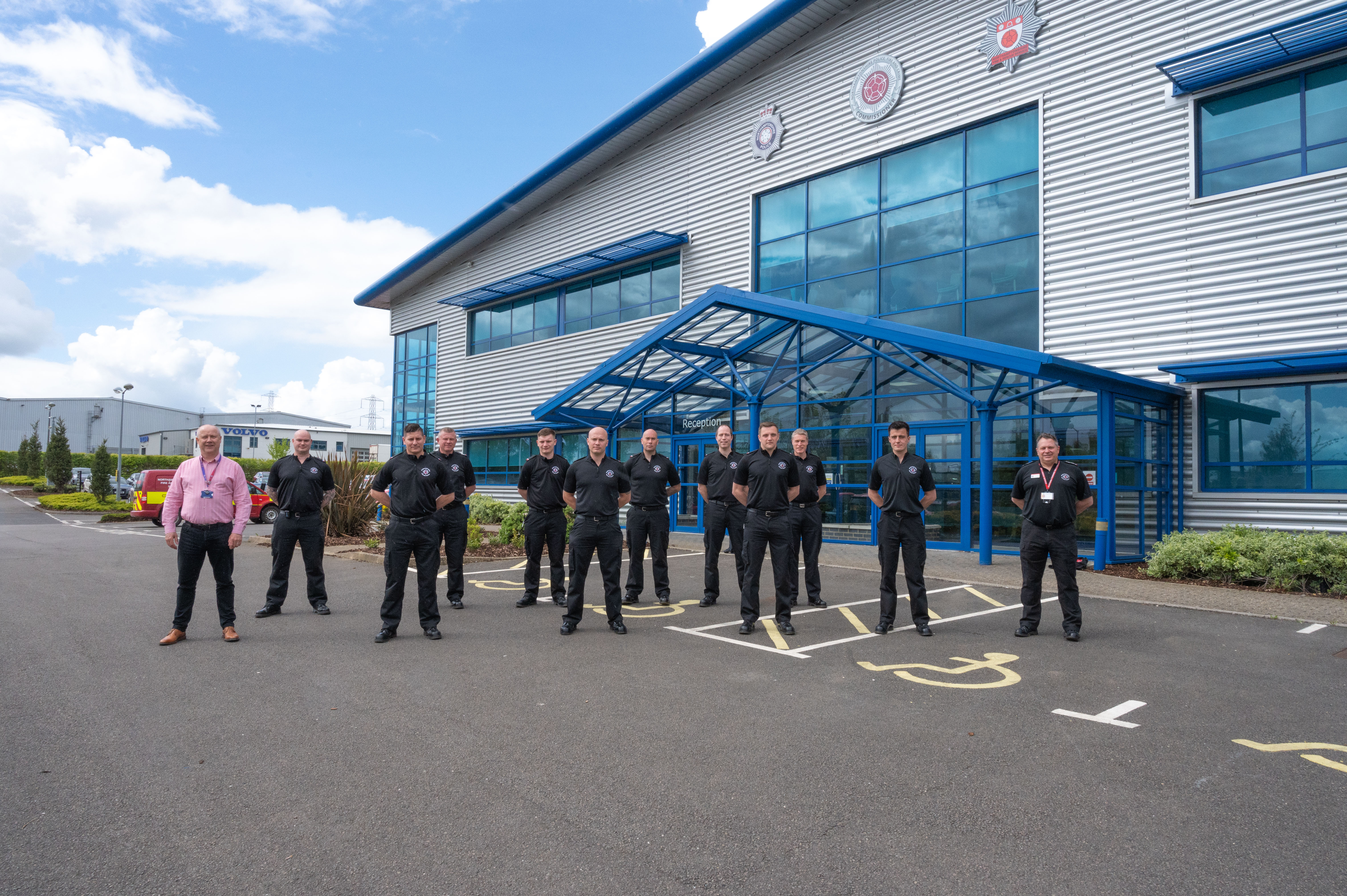 New recruits standing outside joint building at Wellingborough