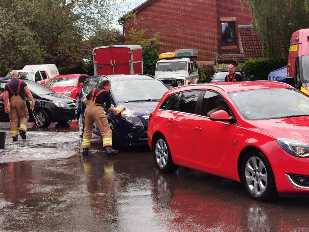 Firefighters washing cars at Wellingborough charity car wash