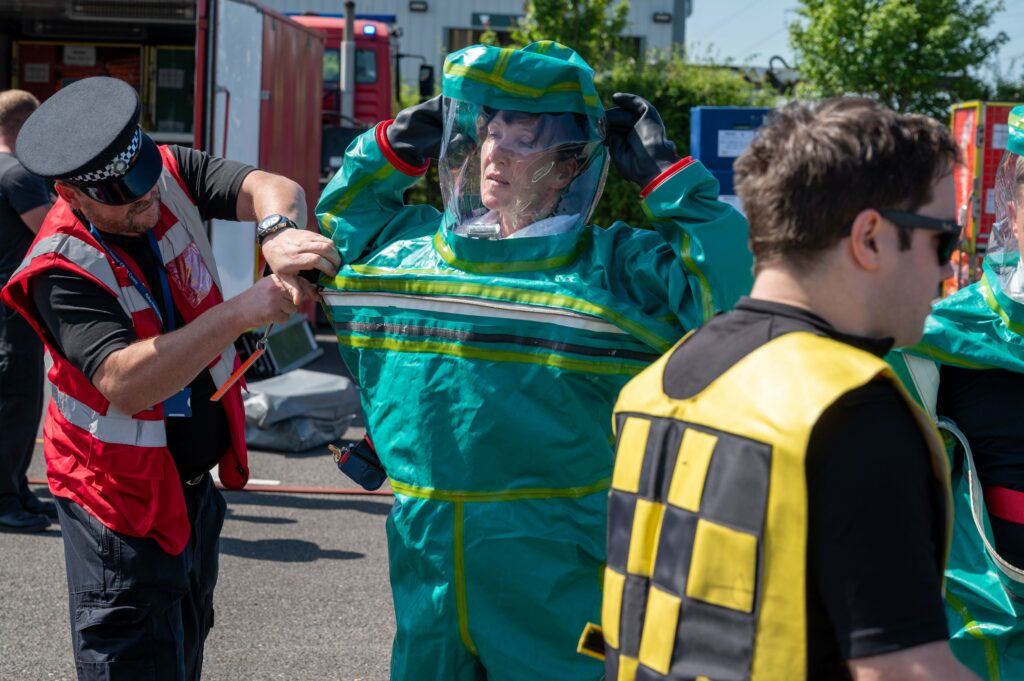 Firefighter in personal protective equipment for a decontamination incident