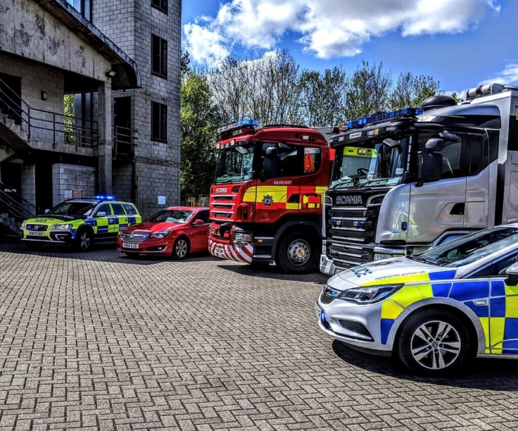 Selection of fire and police vehicles including cars, an appliance and the Joint Command Unit