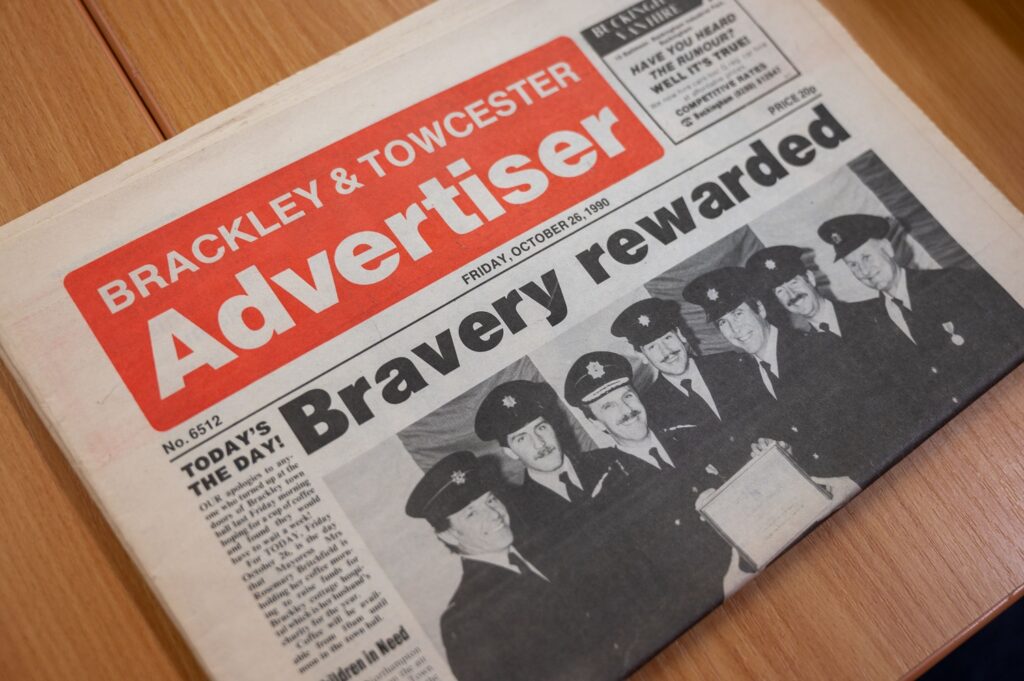 Brackley and Towcester Advertiser newspaper showing archived article of fire crews bravery