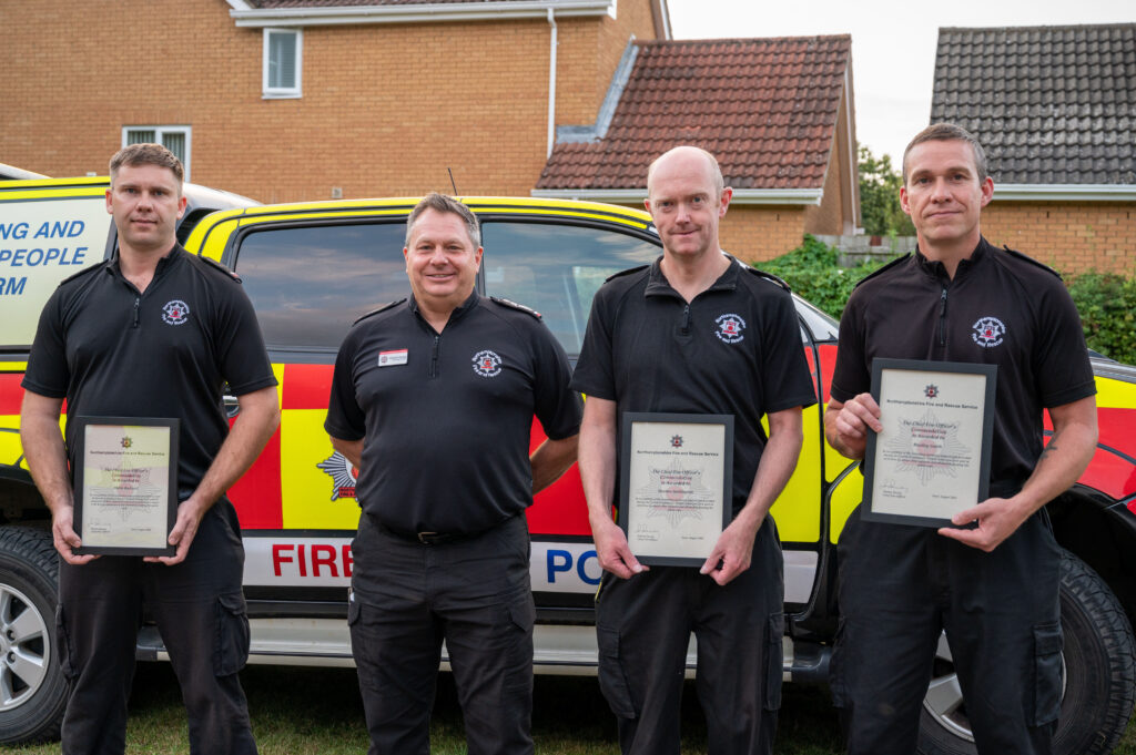 Three crew members from Raunds Fire Station with their Chief Fire Officer commendations