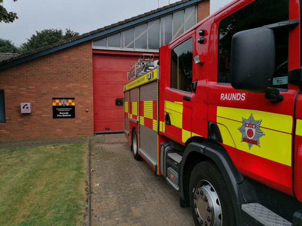 Fire appliance from Raunds parked outside the front of the Fire Station