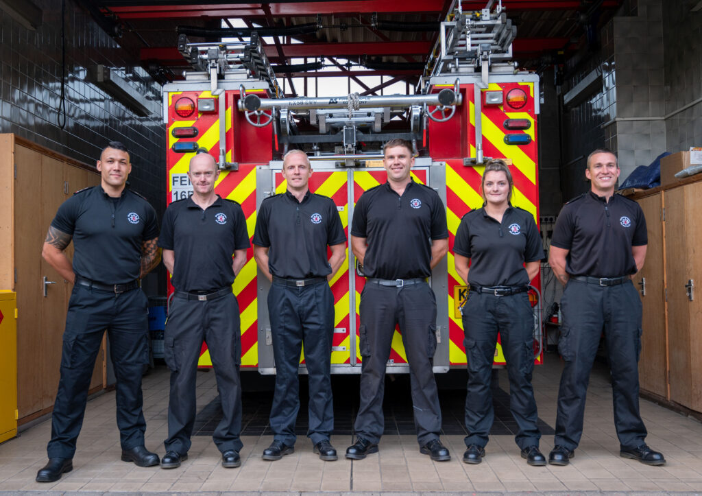 Crew members from Raunds Fire Station in front of appliance