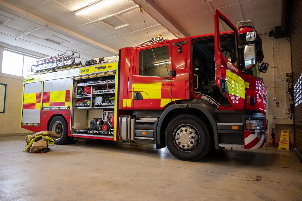 Side view of fire appliance showing some equipment inside