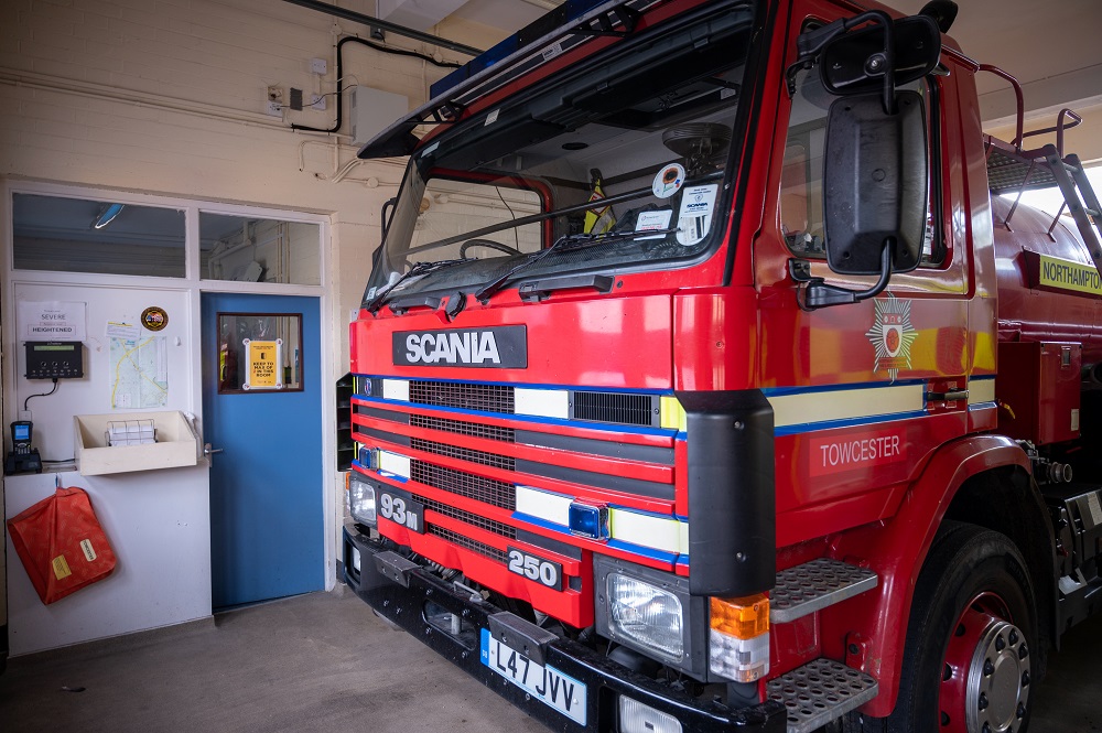 Close up of front of fire appliance inside Towcester Fire Station