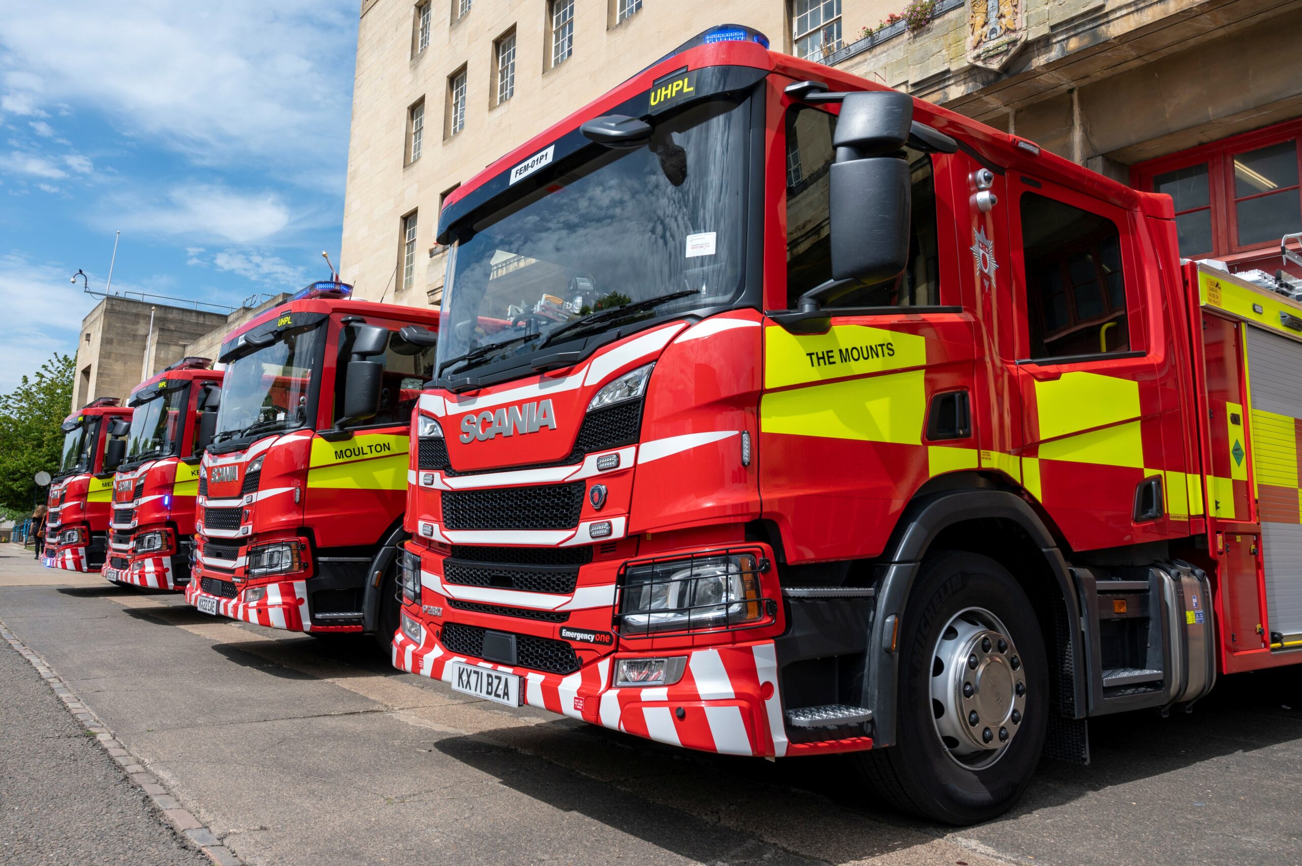 Four new fire engines pictured outside The Mounts fire station in Northampton in 2022