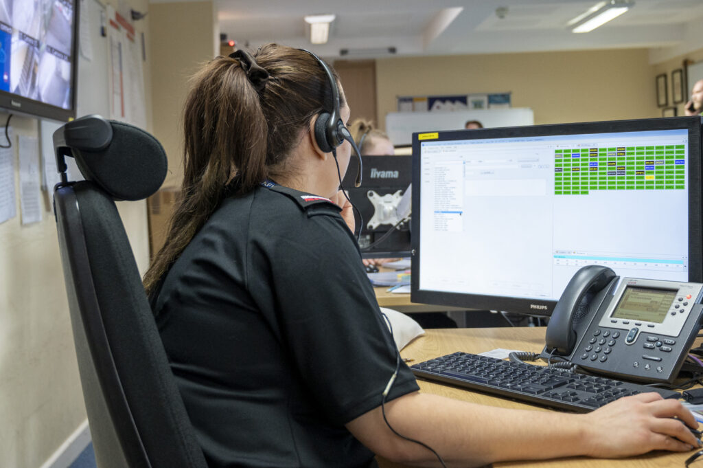 A member of Fire Control looks at a computer