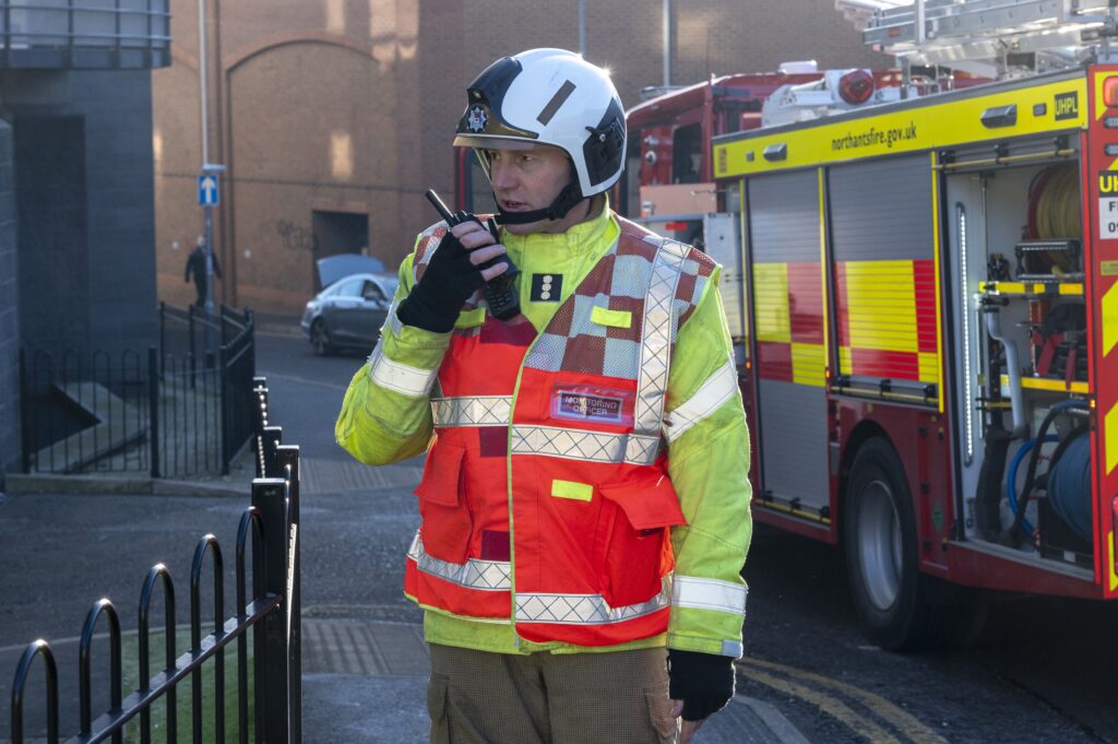 The Mounts Station Manager Chris Bridgewater talking on his radio during a training exercise