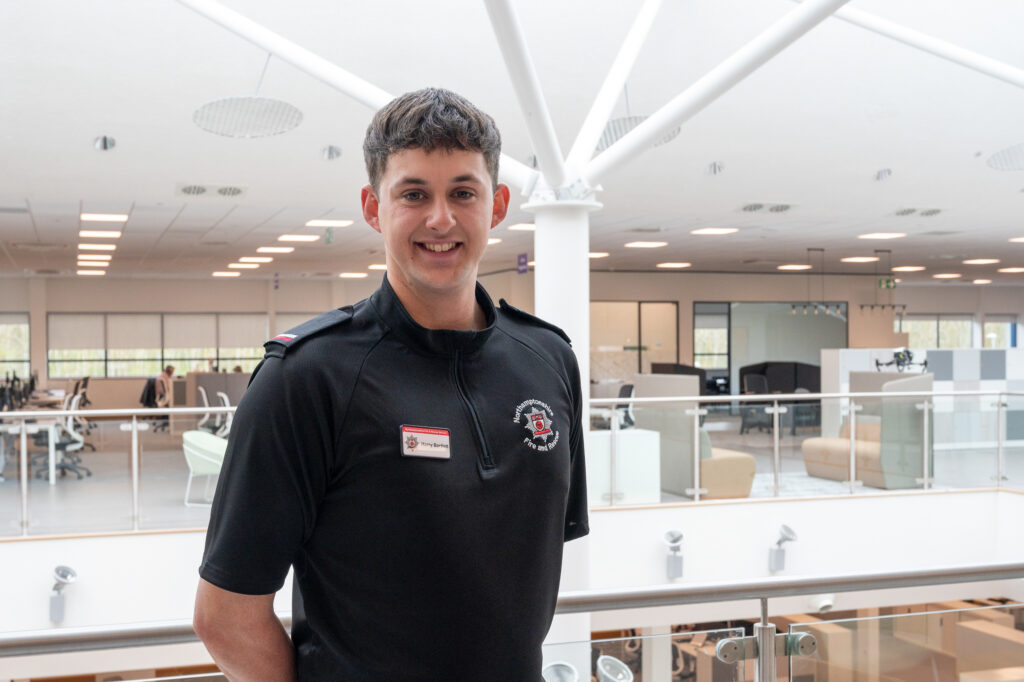 New firefighter Harry Bartlett posing for a photo at Darby House