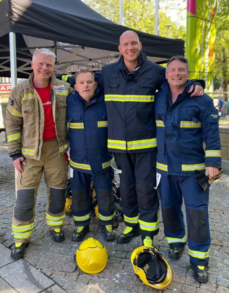 Shown left to right in their firefighter uniforms are Stef Douglas, Ronnie Sherratt, Aaron Childs and Paul Webb. All four represented Northamptonshire at the Welsh Firefighter Challenge in Swansea in June 2023.