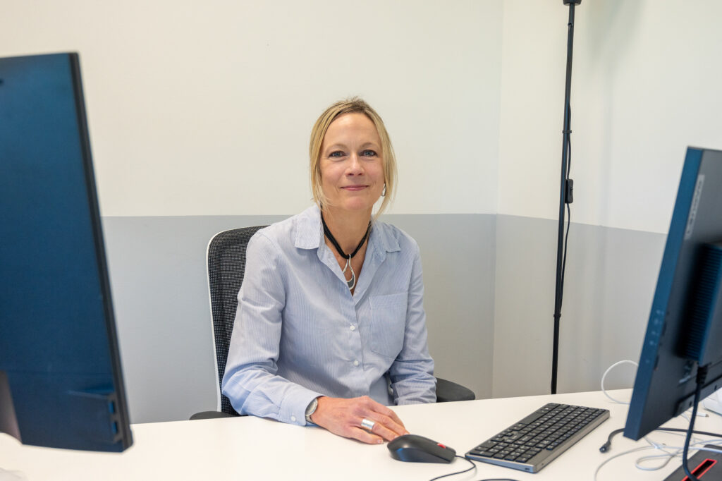 A photo of Northamptonshire Chief Officer Nicci Marzec sat behind her desk