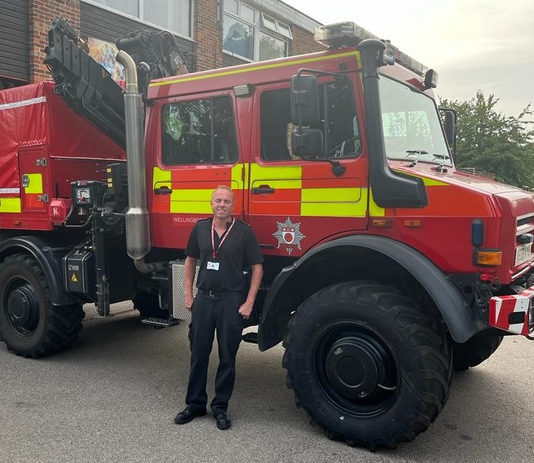 Mick Titcombe in front of the Unimog