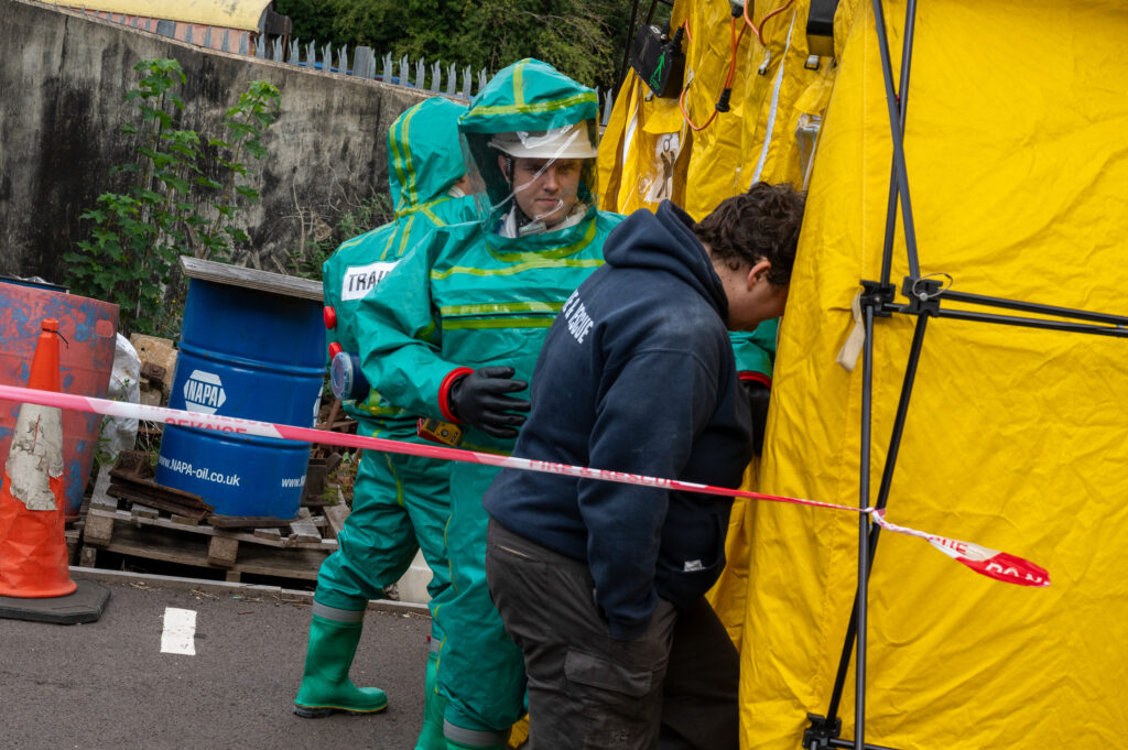 A firefighter in protective equipment