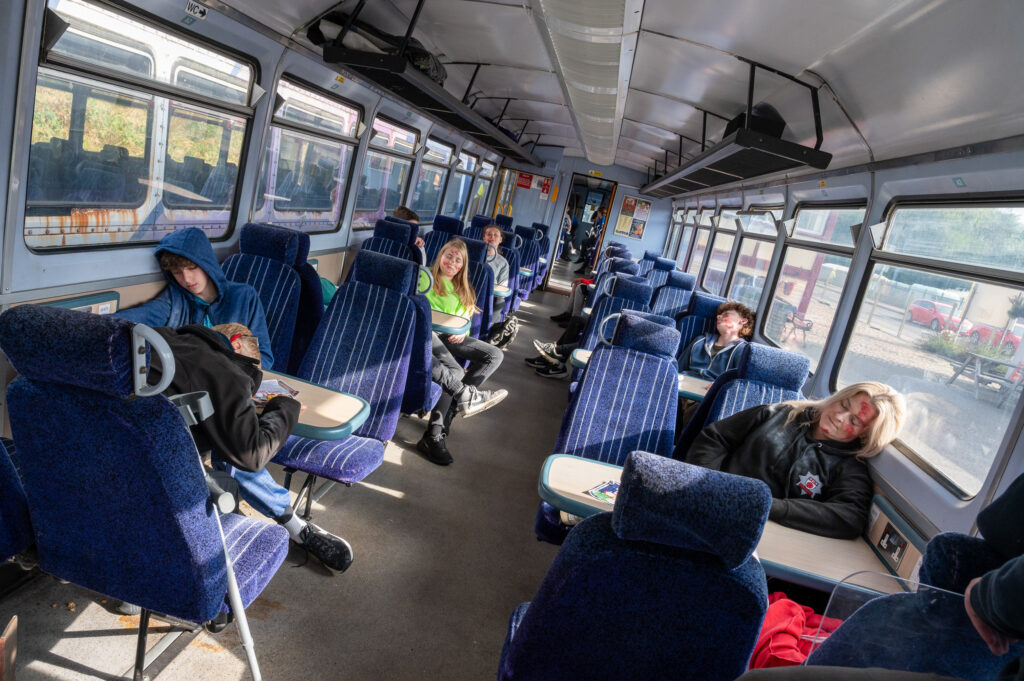 A train carriage full of actors pretending to be casulties