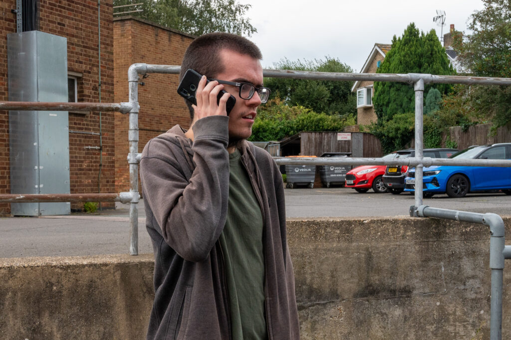 A member of the GAINN project on the phone to the fire control room