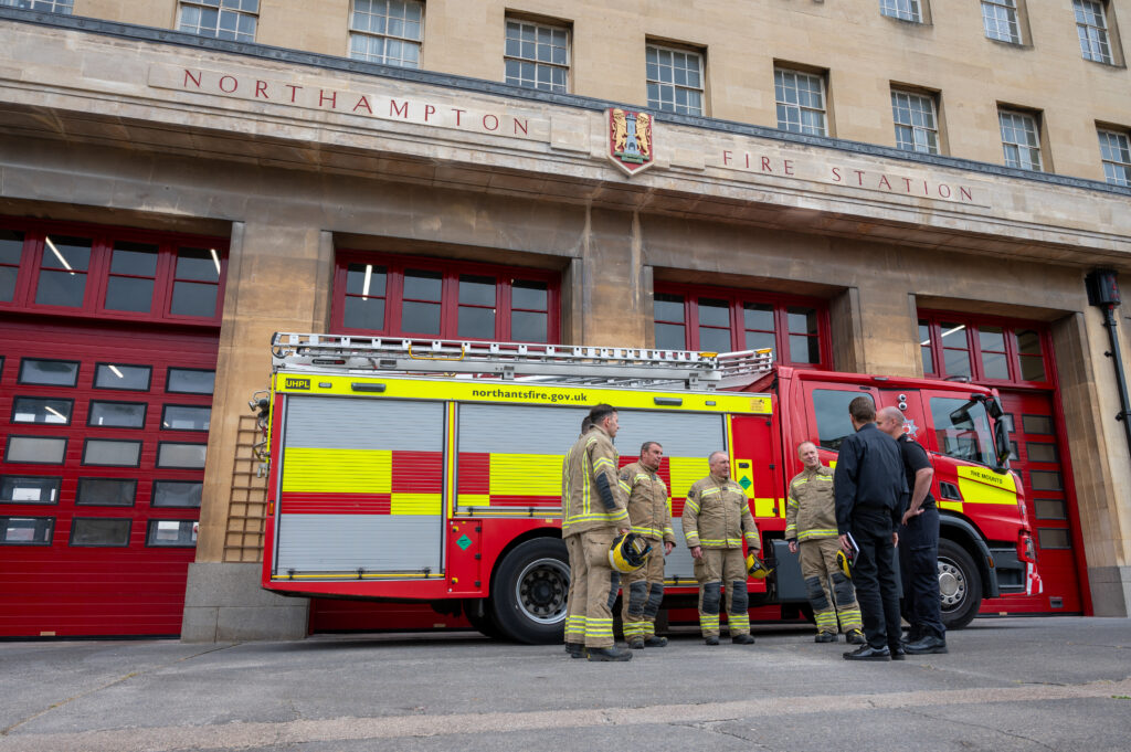 The Mounts red watch crew, MJ from the Property team and station commander Andy Luxton outside the station.